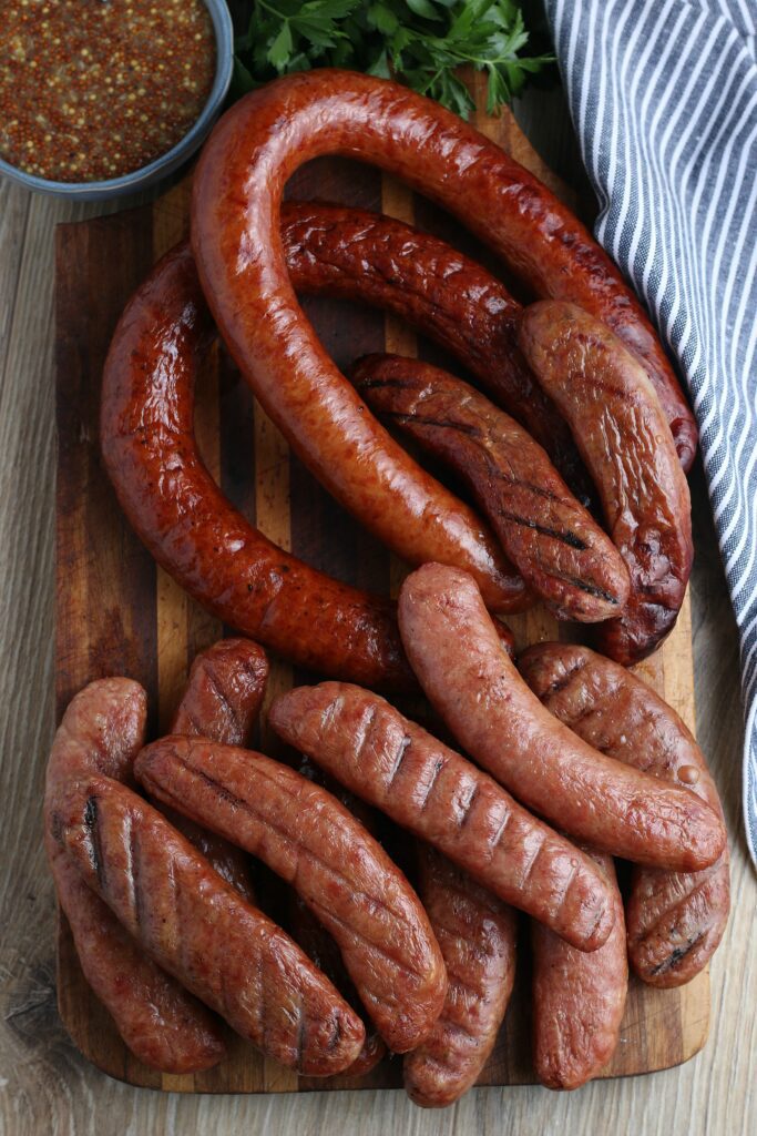 smoked sausage served on cutting board