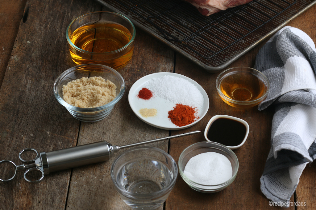 Pork Shoulder Injection Ingredients displayed on wood board