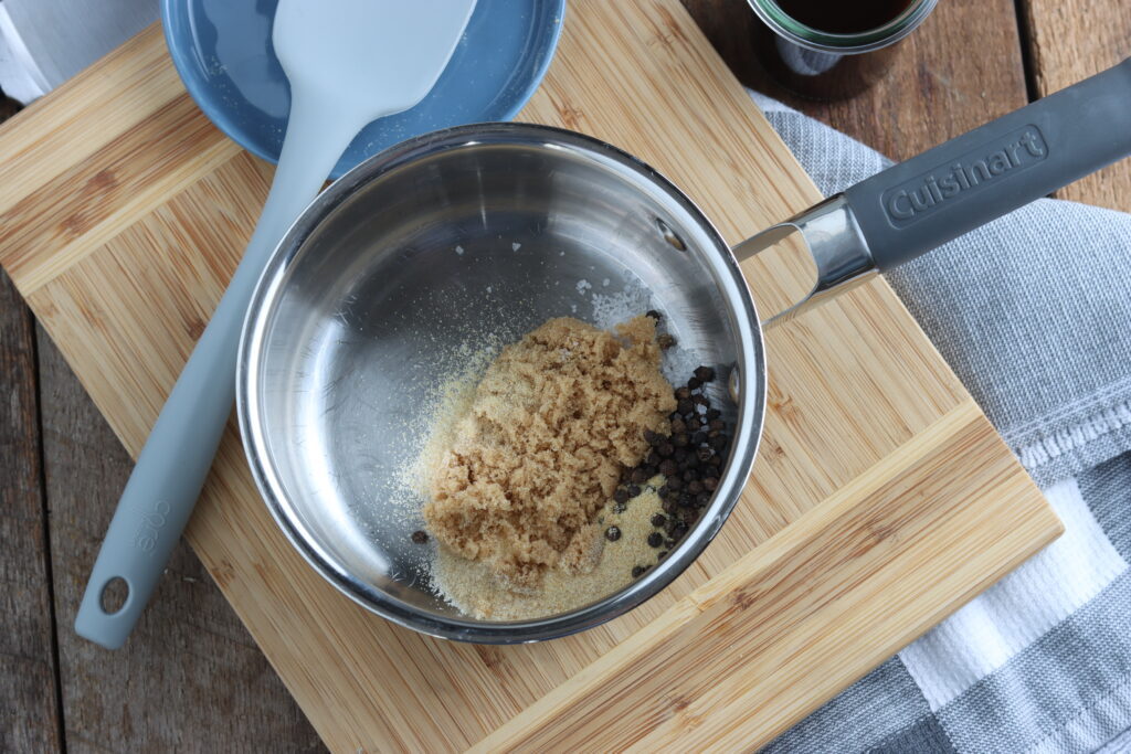 brown sugar and black peppercorn in pot