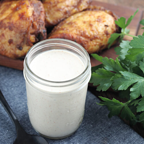 alabama white sauce served with chicken thighs