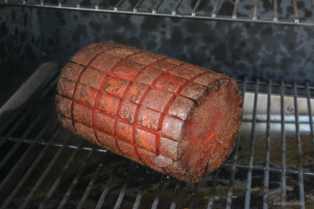 Smoked bologna on smoker.
