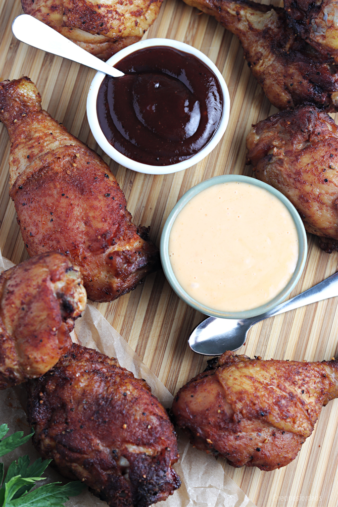 smoked chicken drumsticks served with bbq sauce