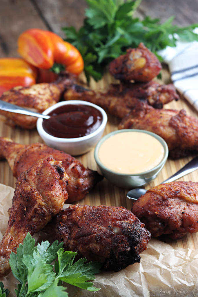 smoked chicken drumsticks served with bbq sauce