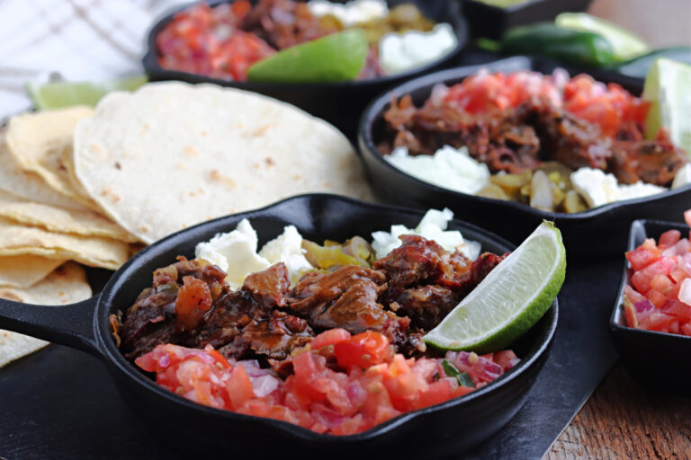 smoked barbacoa served with salsa, cheese and lime