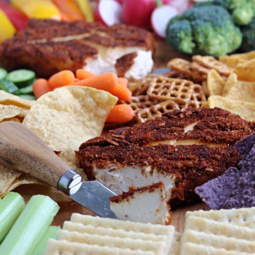 smoked cream cheese on tray with vegetables and chips