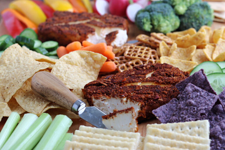 smoked cream cheese on tray with vegetables and chips