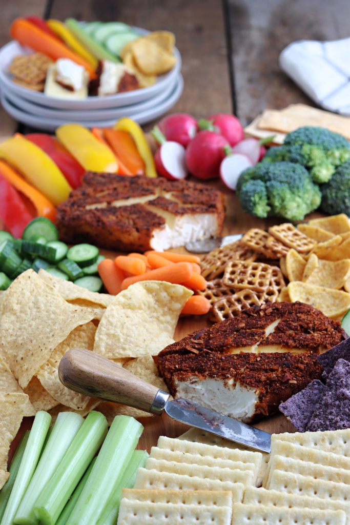 smoked cream cheese on tray with vegetables and chips