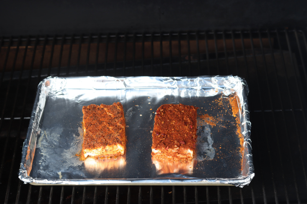 cream cheese on foil lined pan on Traeger smoker