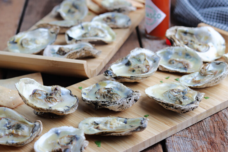 smoked oysters on wood boards