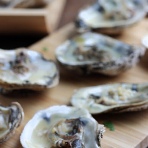 smoked oysters on wood boards