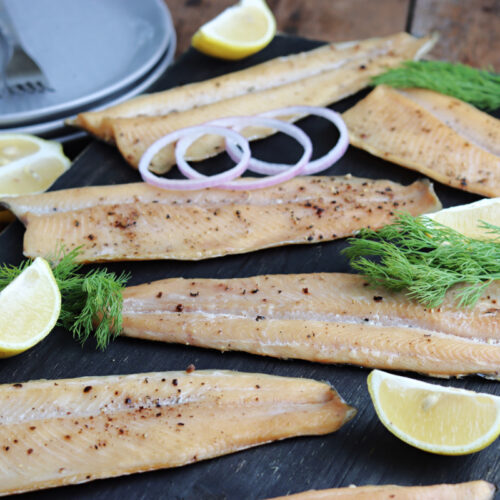 smoked rainbow trout with onions, lemons and dill