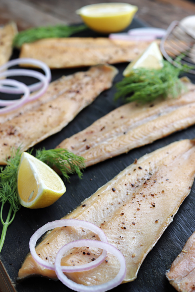 smoked rainbow trout with onions, lemons and dill