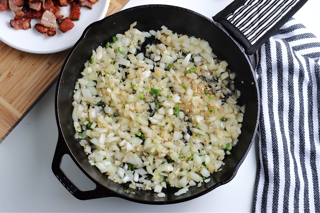 onions, peppers and garlic cooked in cast iron skillet